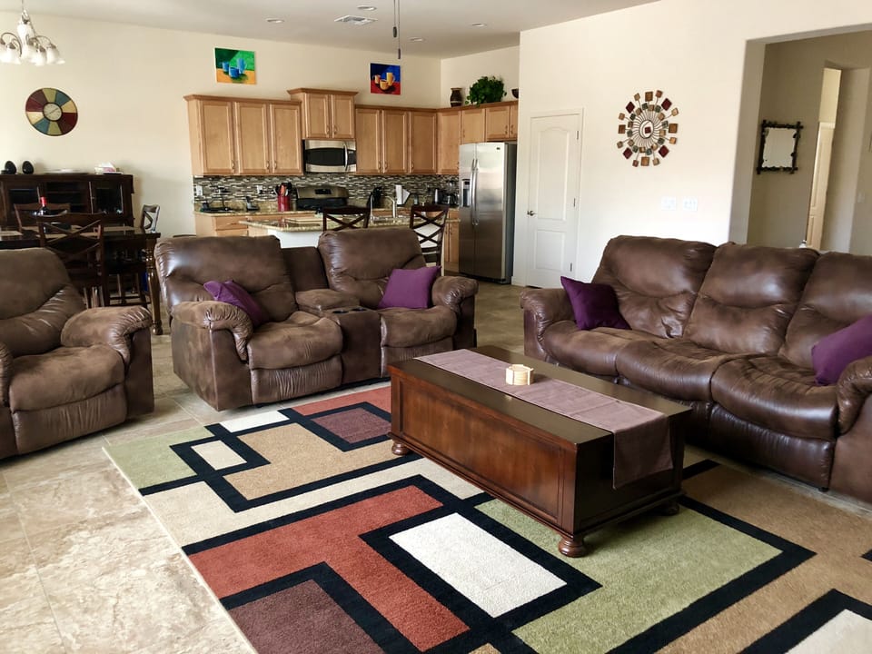 Comfortable, reclining sofa, love seat, and chair.