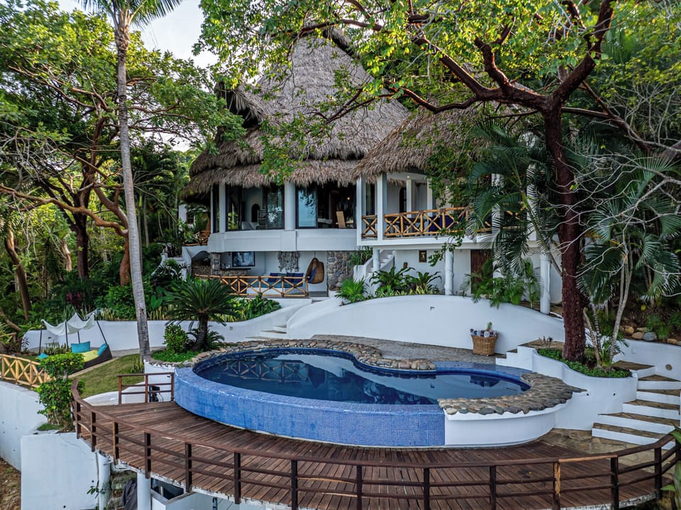 Enjoy a float in our heated pool perched above the stunning Nayarit coastline.