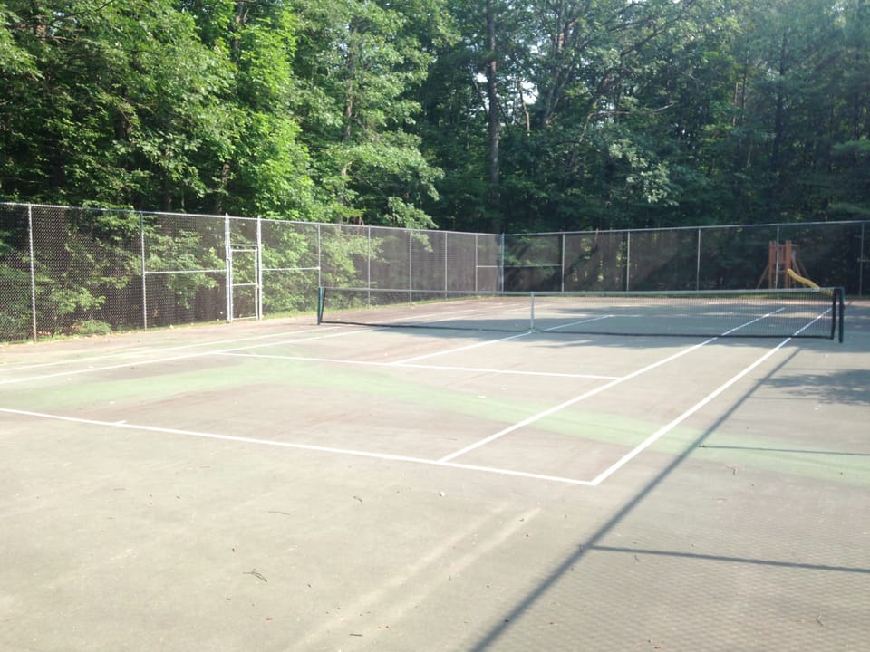 Tennis Court Next to Pool