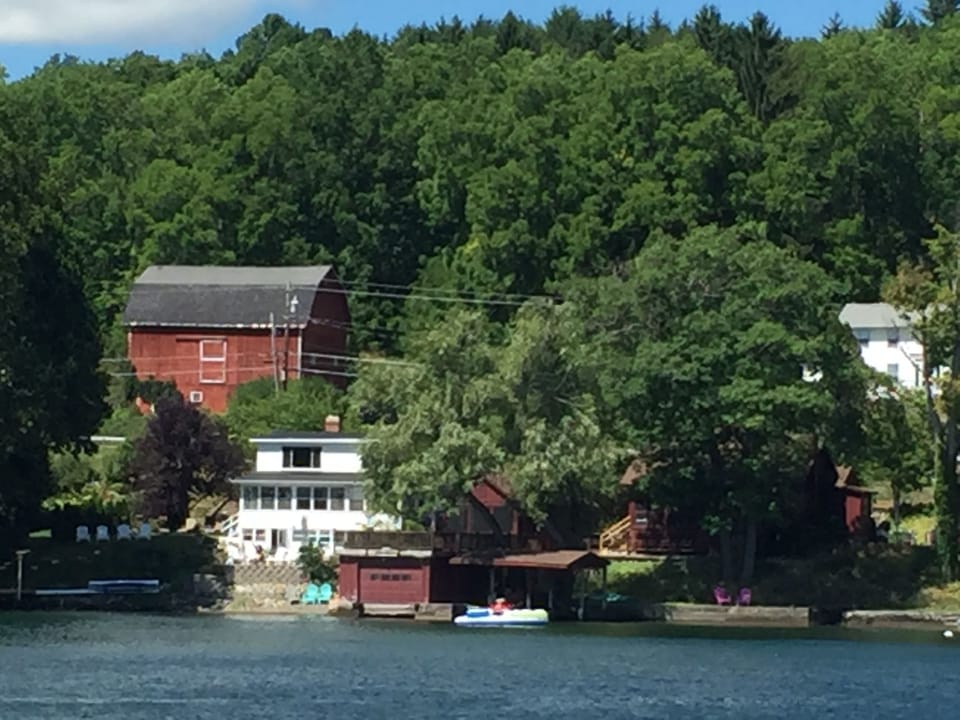 View from lake looking at Cottages. Boat house 