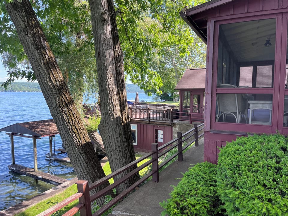 view from private patio with grill and table and chairs 