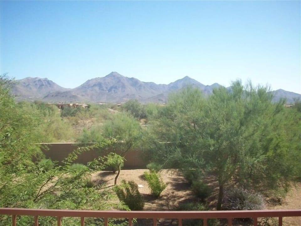 Peaceful relaxation looking out to the McDowell mountains! Upper balcony view.