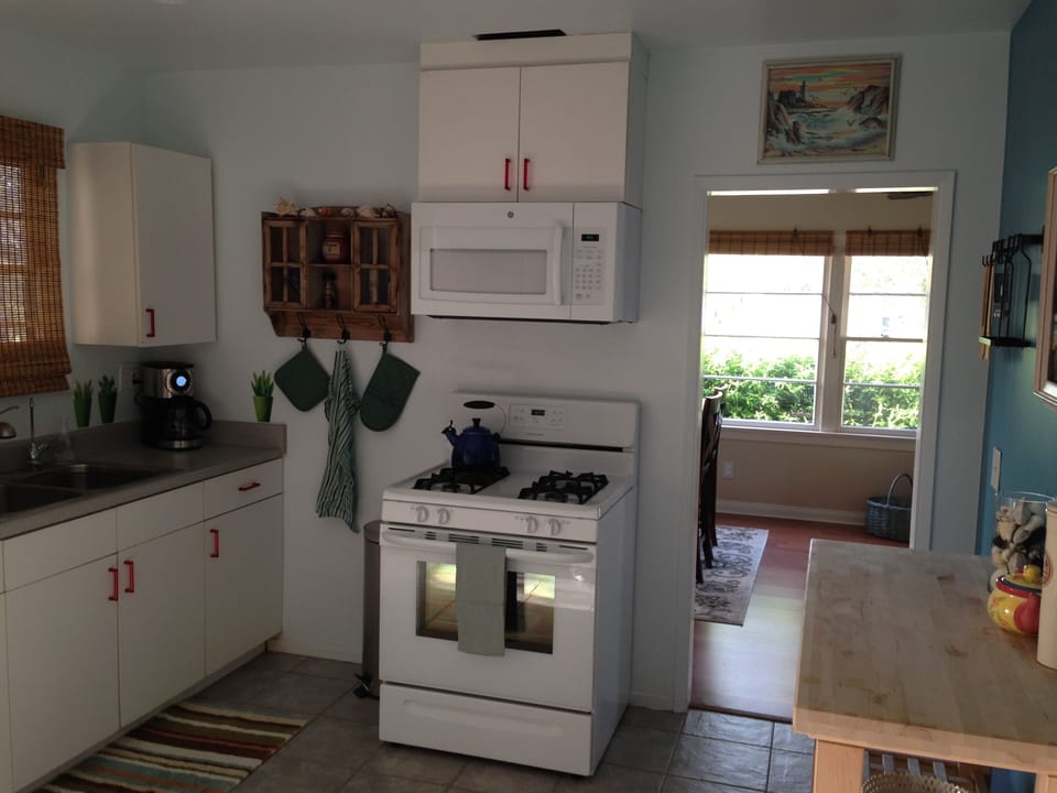 Kitchen with brand new Microwave and Gas Oven Range