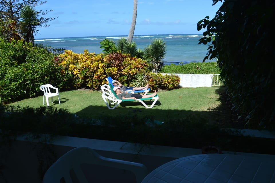 Enjoy sitting on our lounge chairs in our backyard looking at the ocean