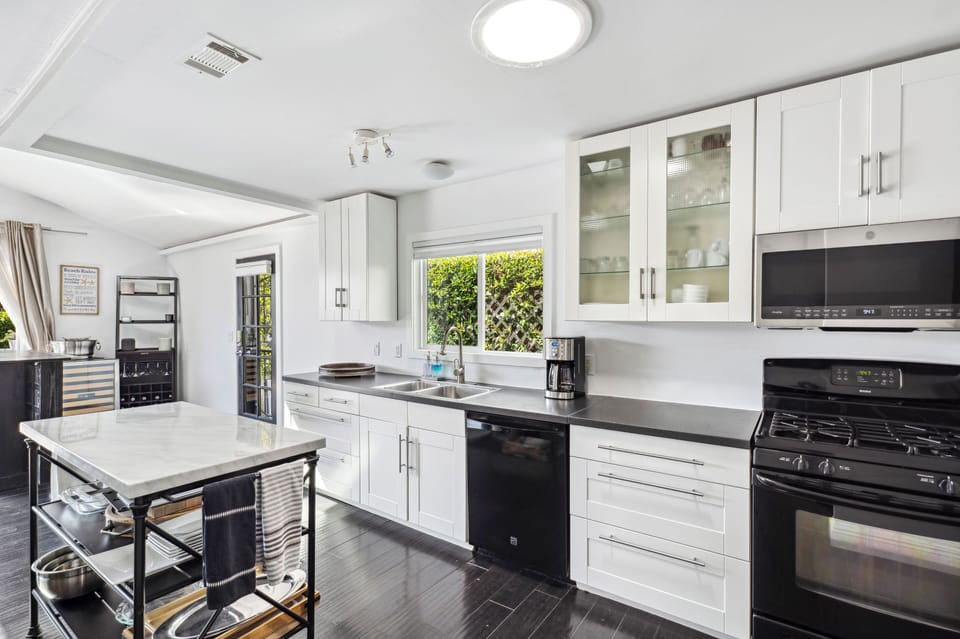Kitchen in open floor plan. Well appointed with everything for the chef!