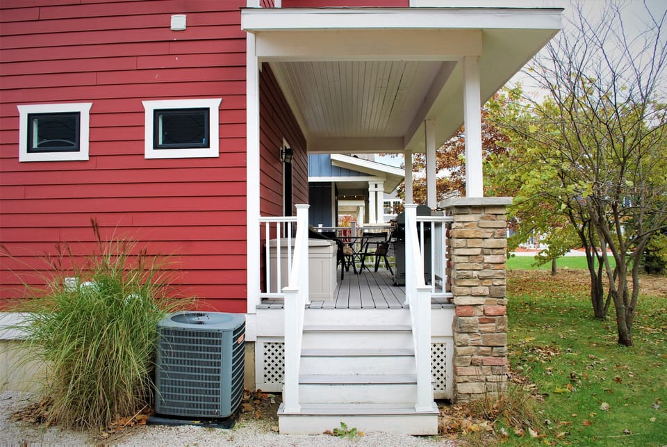 Covered back & front porches provide additional living space with BBQ grill.