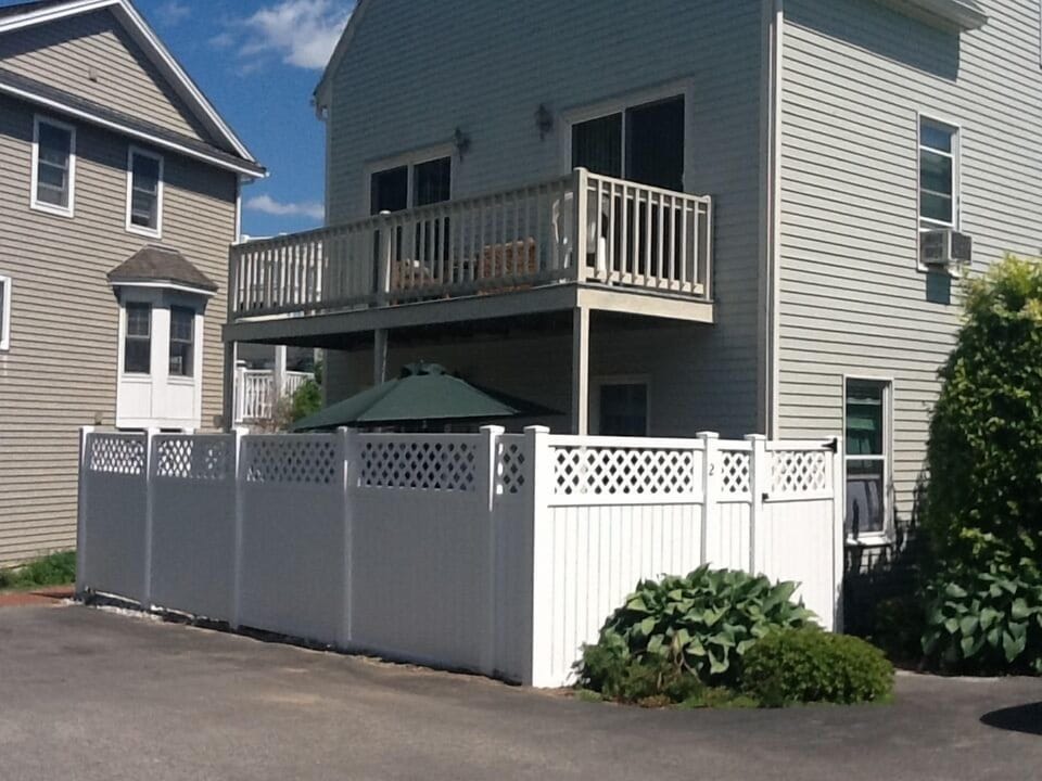 Fenced in, private patio, second-floor deck, and 2 parking spots