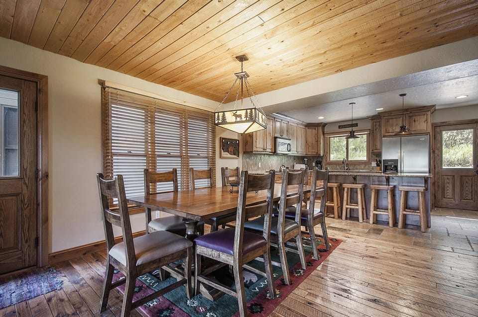 Formal dining room with seating for eight (8) people. Breakfast bar in kitchen.