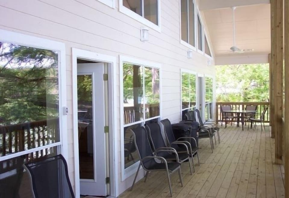 Large covered porch provides protection from afternoon showers