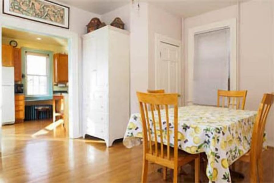 Dining room, powder room, and kitchen entry