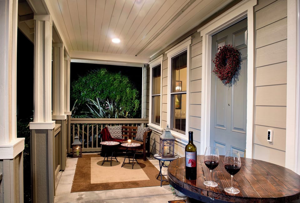 Enjoy happy hour on the covered front porch.