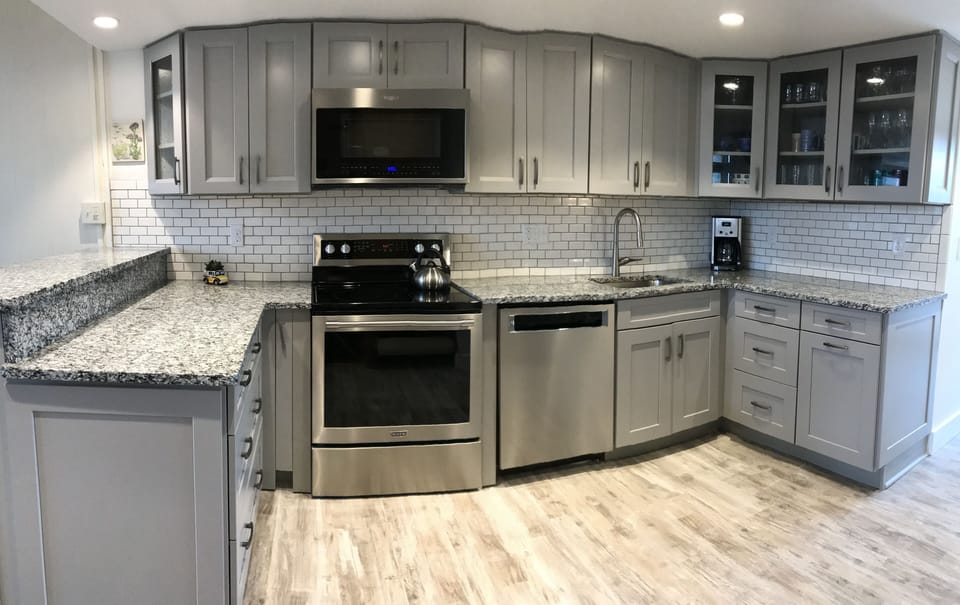 Kitchen cabinets, appliances, granite and floor as of 05/2018
