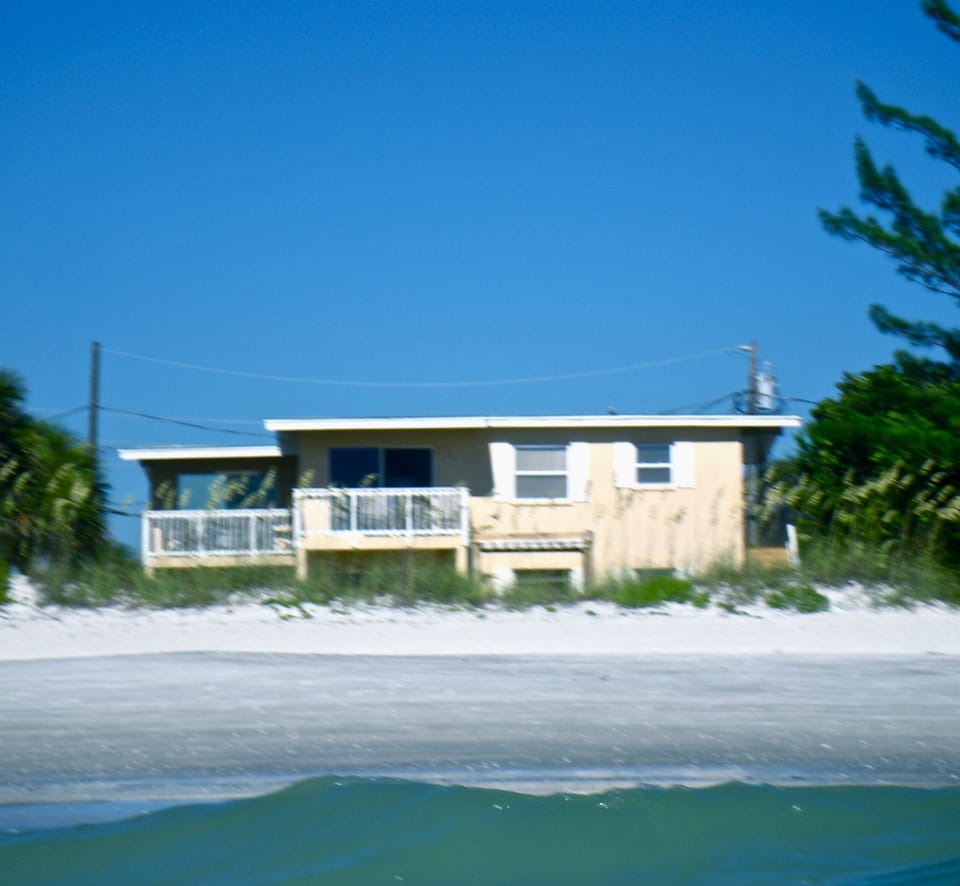Unit 4 Upstairs Left - 15' above sea level and 25' from the beach!