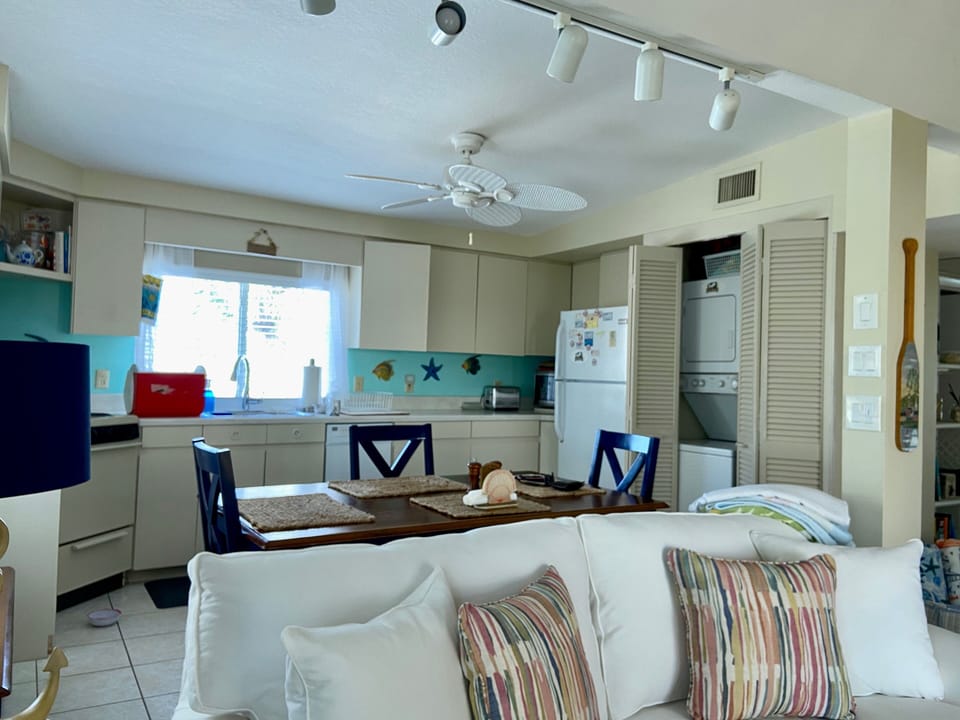 Pullout queen & raised kitchen with ICW view to the east, washer & dryer.