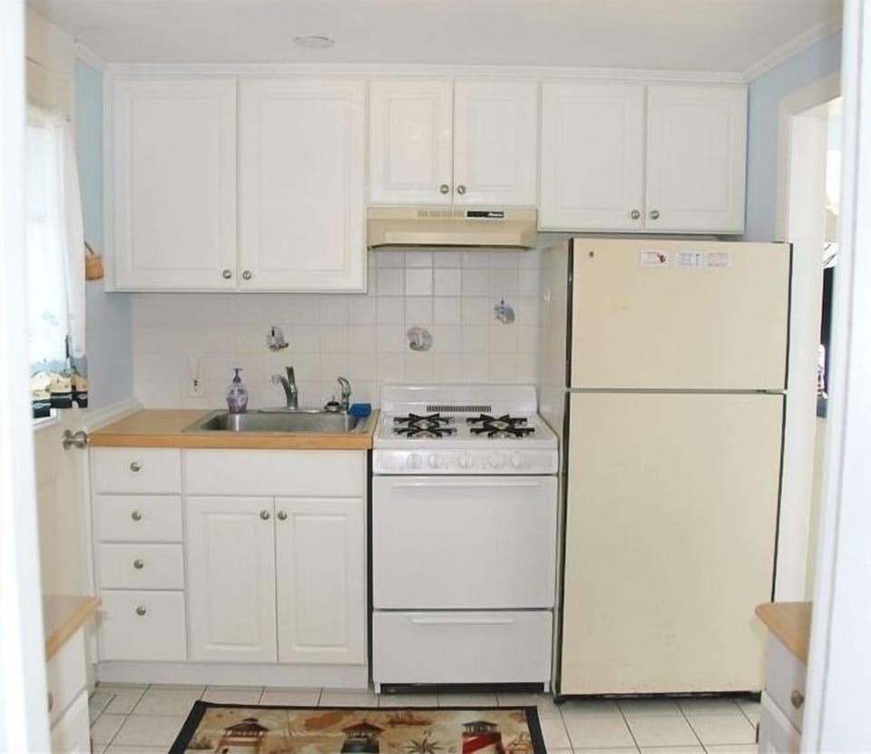 Full kitchen. (main bath with tub/shower is off this room)