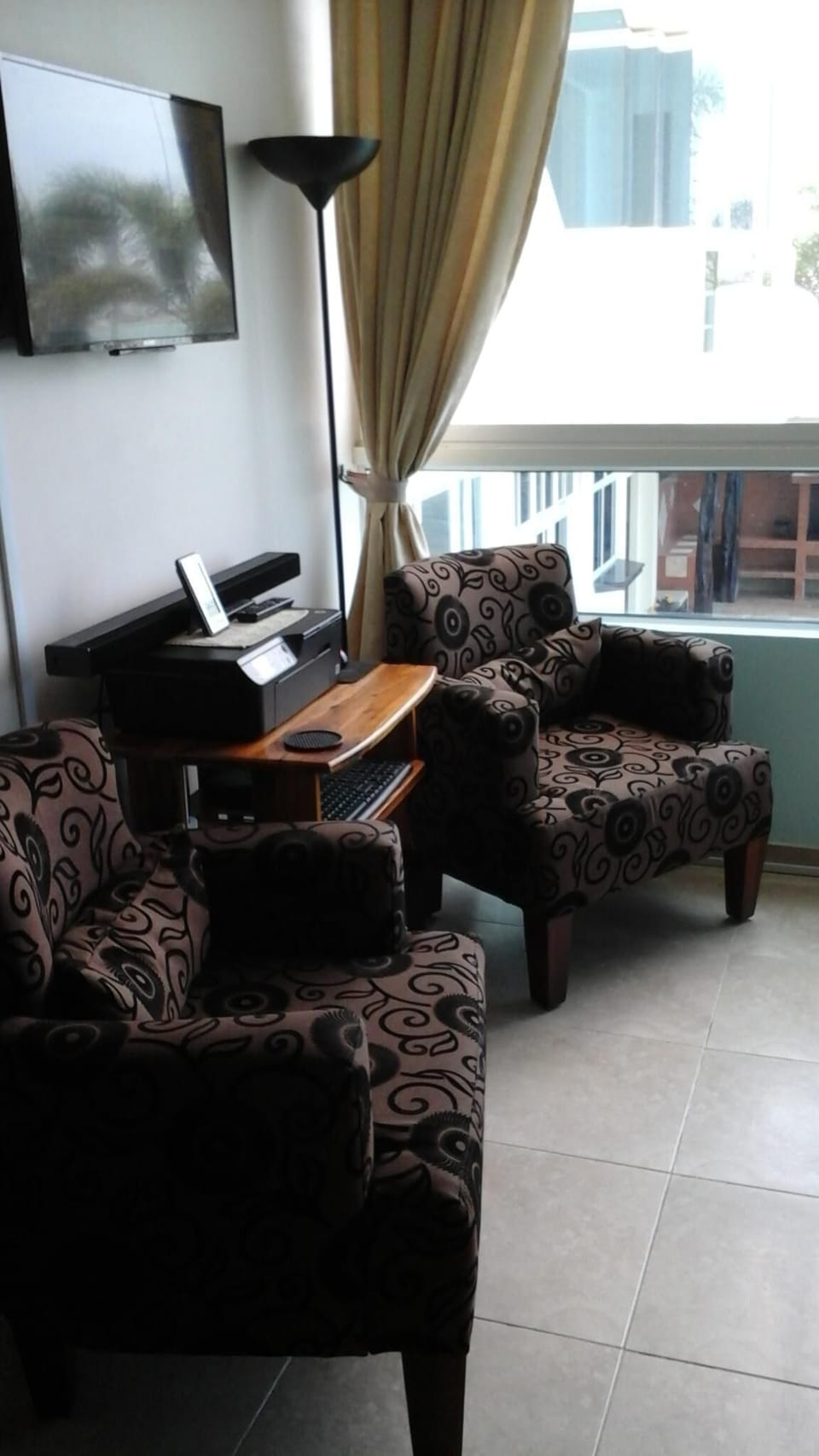 Living Room Extra Chairs and Wall-Mounted 32" Sony TV w/DVD player 