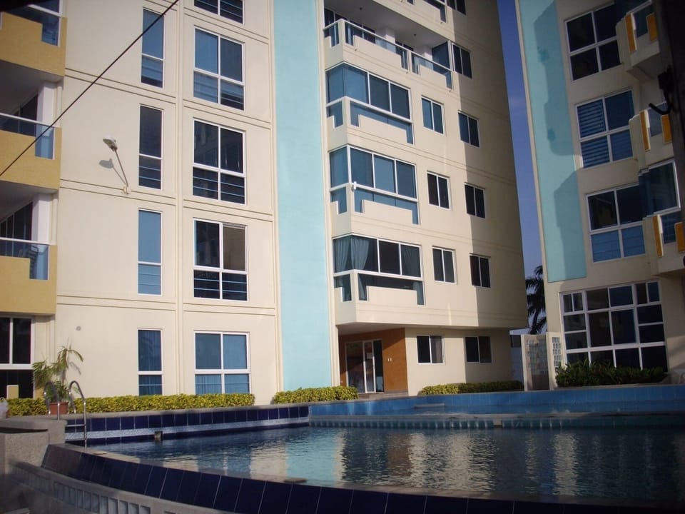 Spondylus 2 Tower A; condo is on first floor above the brown tiled doorway