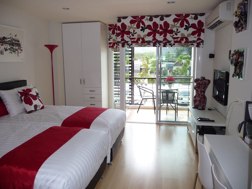 View from kitchen corner towards balcony.