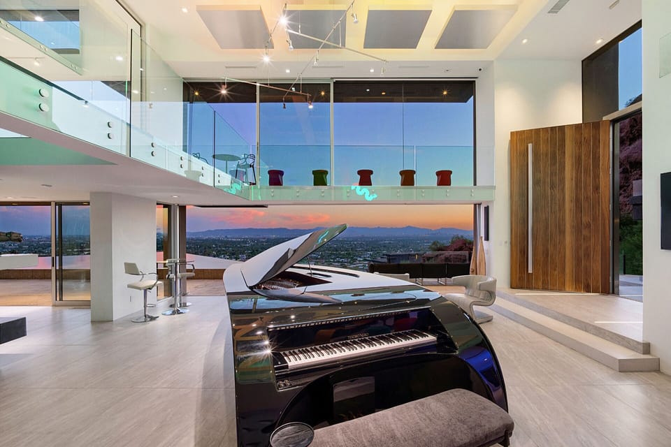 Rare self-playing grand piano located off the main entrance w/ amazing views