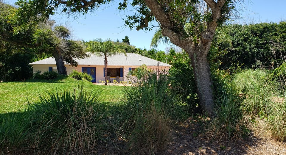 Large front yard for kids to play and plenty of off street parking in driveway.