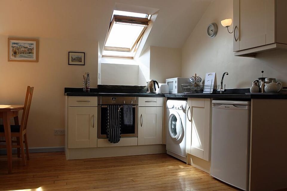 The Barn's Kitchen: Fridge, Induction hob, Electric oven, washing machine