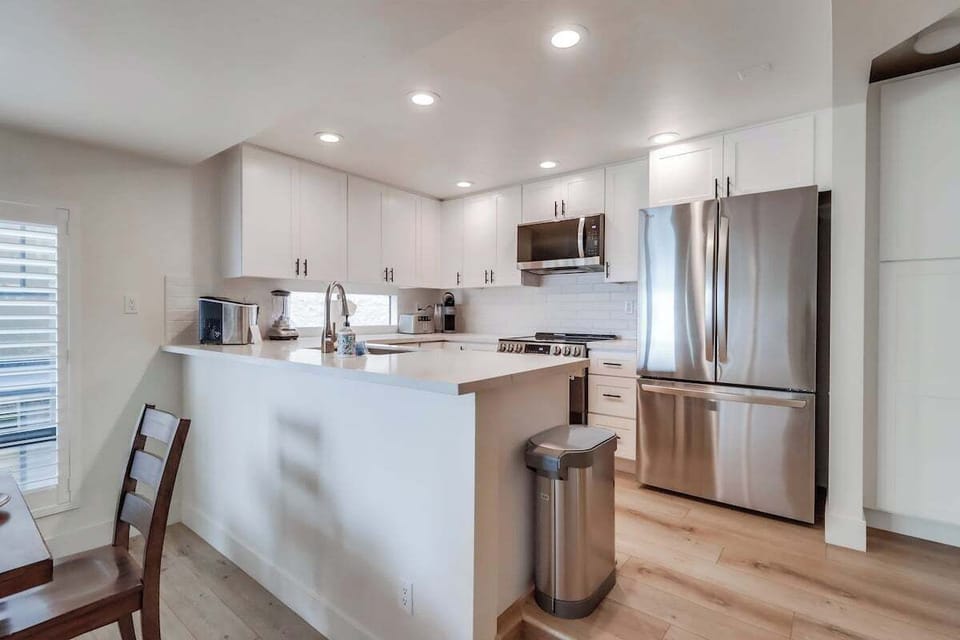 BRAND NEW KITCHEN! All new flooring, recessed lighting, appliances and cabinetry! Includes a dishwasher.