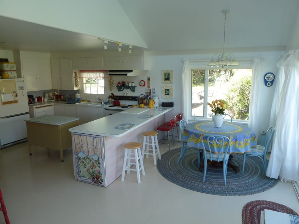 S.P.A.C.I.O.U.S kitchen and dining area with views of the pond! 