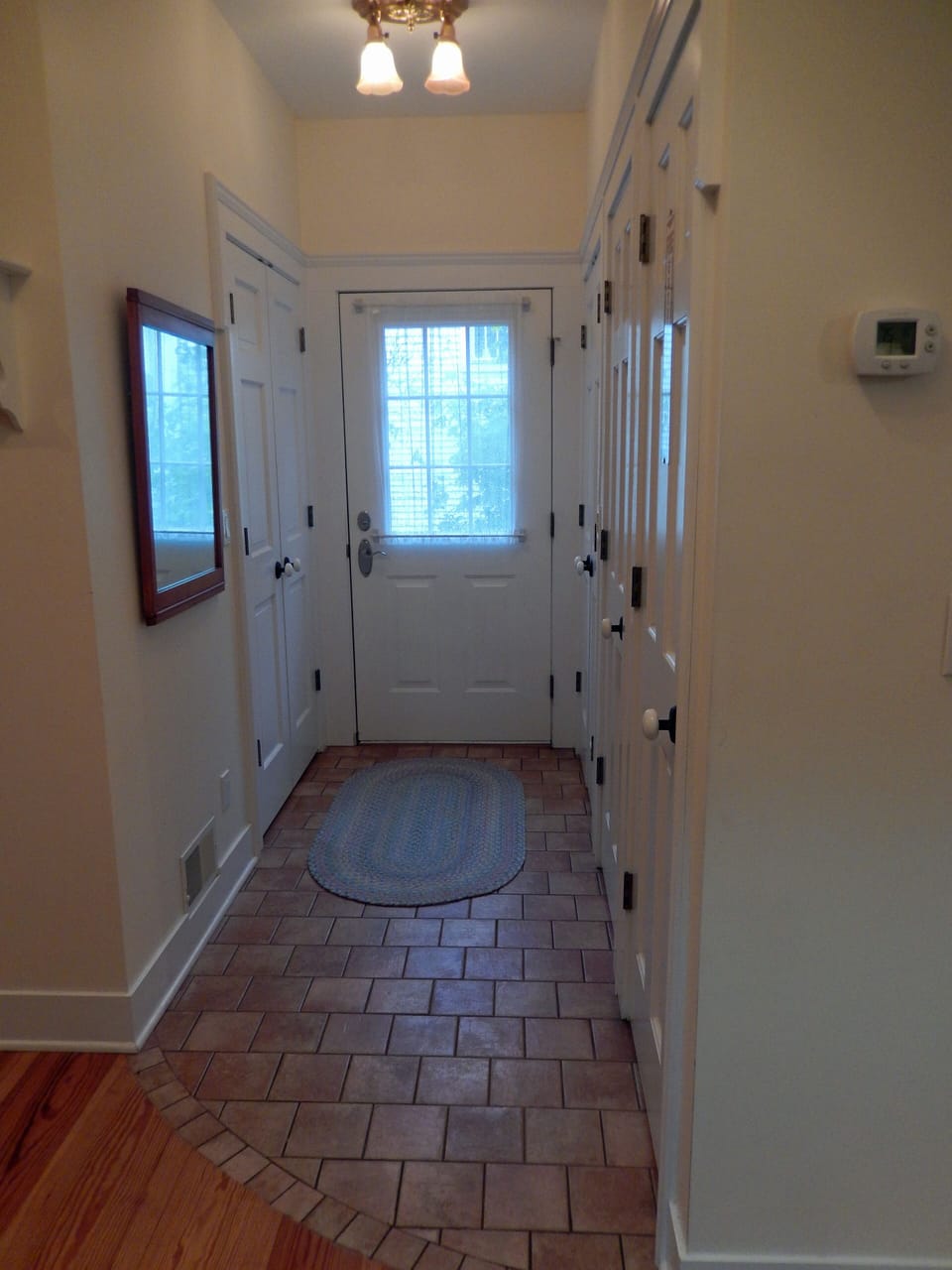 Apartment Side Entrance/Laundry Hallway