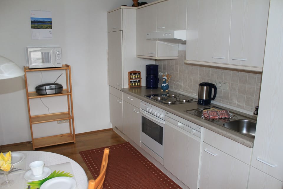 Kitchen with fitted appliances and micro
