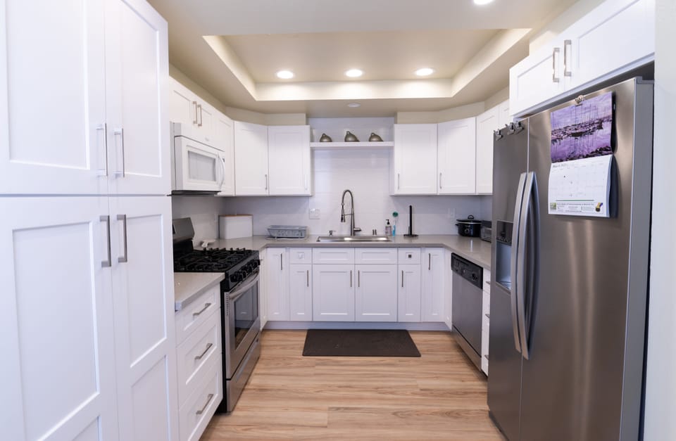 Plenty of storage space in the cabinets in new kitchen 