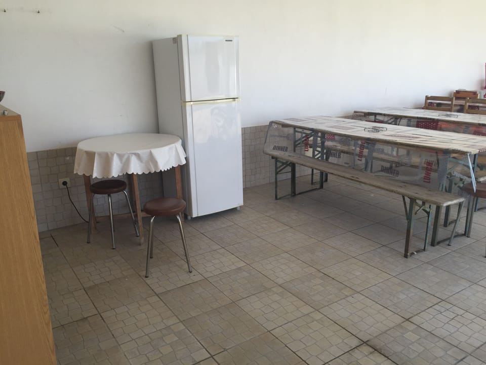 Exterior tables and fridge