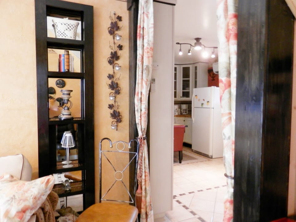 view from living room to Tuscan kitchen