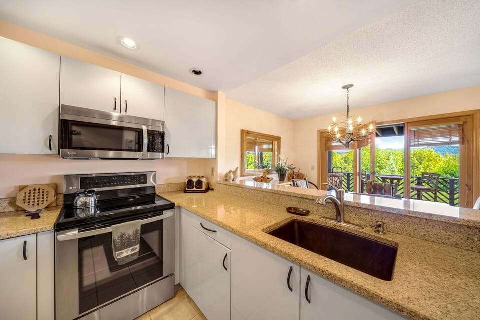 Another view of our kitchen,, with great views too... 