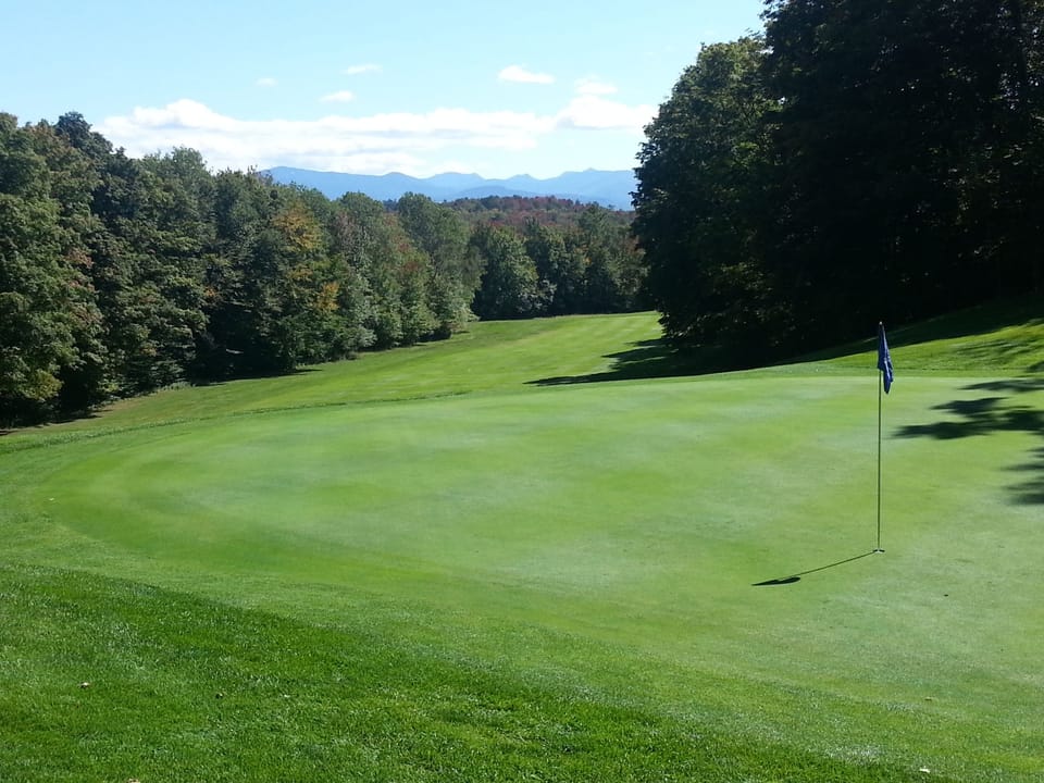 The 6th hole which overlooks the high peaks, a dog leg par 5!