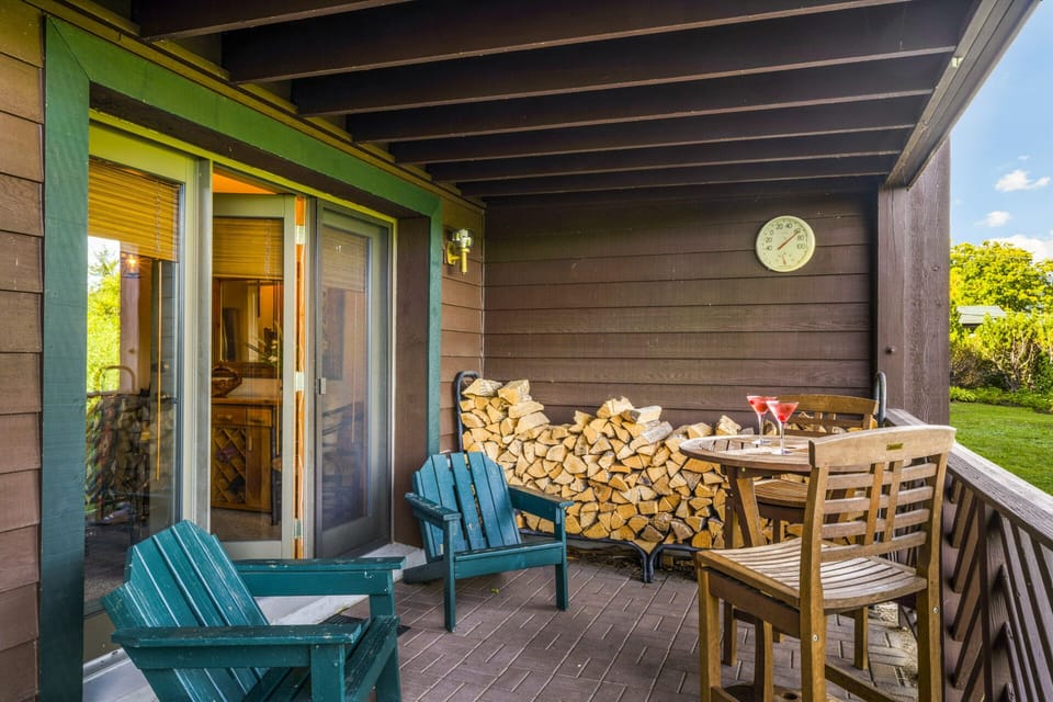 The patio, with a table and chairs plus a great yard for the kids to play in!