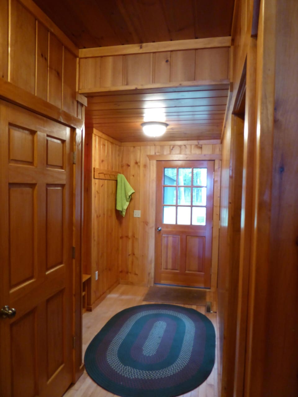 Hall to back door; Master Suite & laundry @ left; full bath & 2 BedRms  @ right.