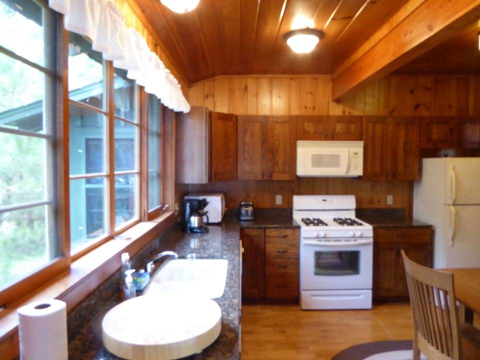 Kitchen: granite counter, coffee-maker, dishwasher, etc., from Living Room.