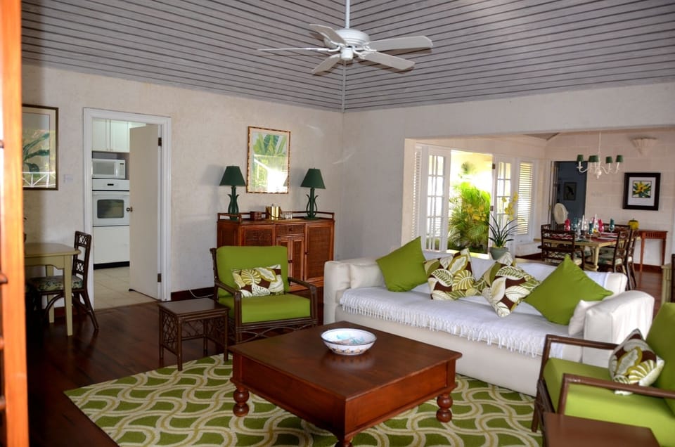 Living and dining showing doors to inner courtyard from dining and to kitchen 