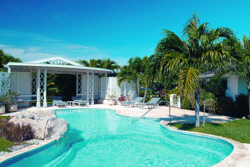 Hunter- Pool and pagoda providing shade by poolside