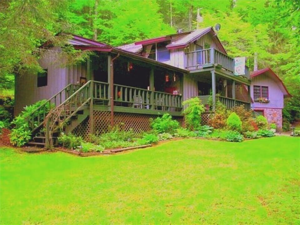 waterway and waterfall in front yard. Hear and see it from all front windows