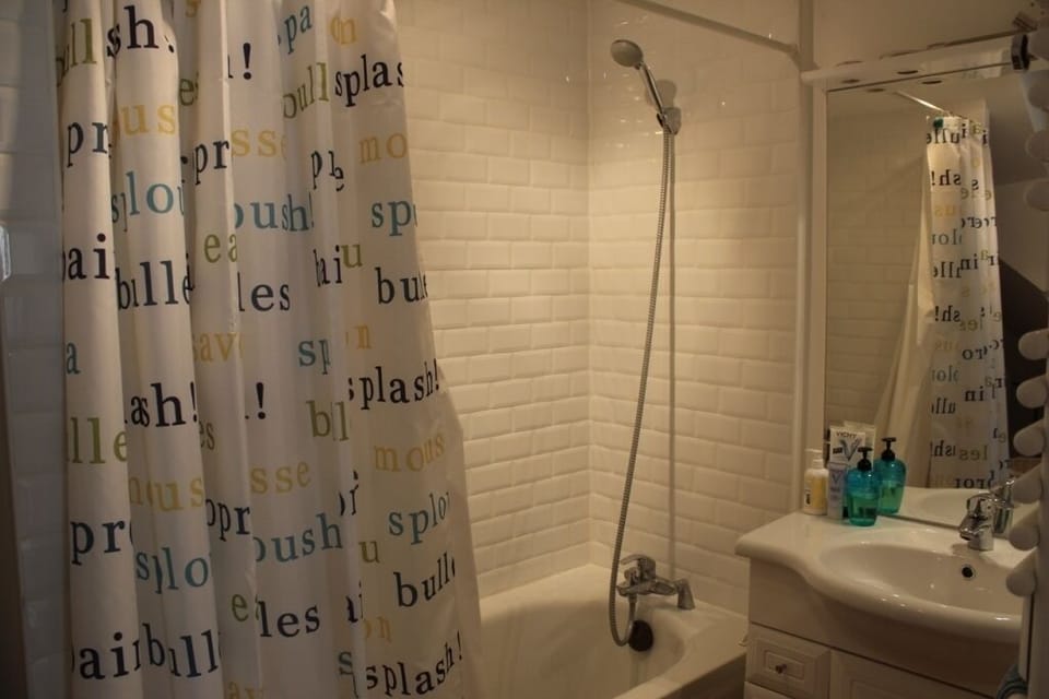 Bathroom is newly renovated, with a washing machine. Toilet is separate.  