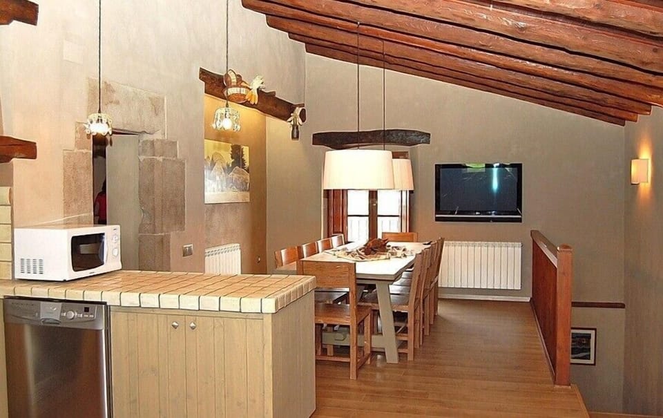 In the dining area you'll find this large TV