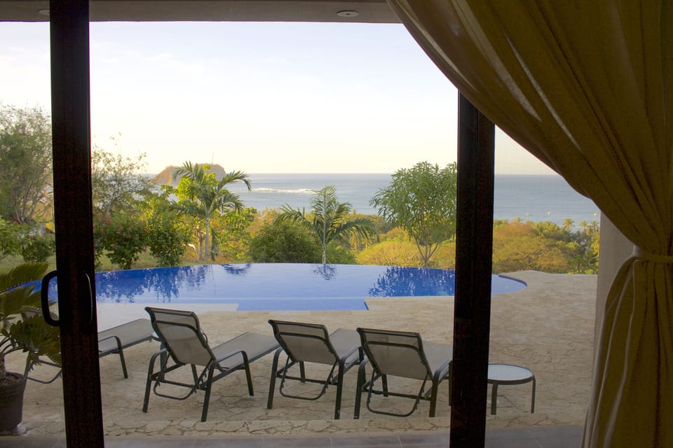 Huge windows and comfy loungers allow you to enjoy stunning ocean views. 
