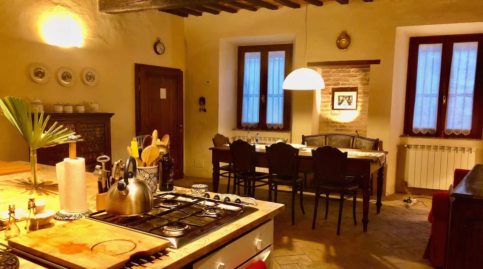 Seats six to eight — the table where stories are shared over wine.