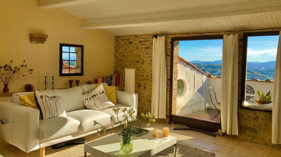 Open living, Tuscan view — inside and outside become one.