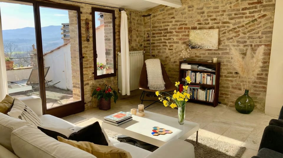Stone walls, fresh flowers, good books — slow down and stay a while.