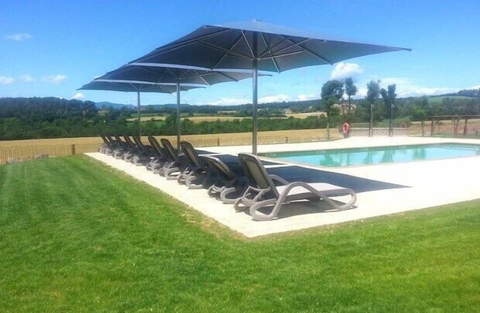 Relax on the sunbeds or cool off in the swimming pool