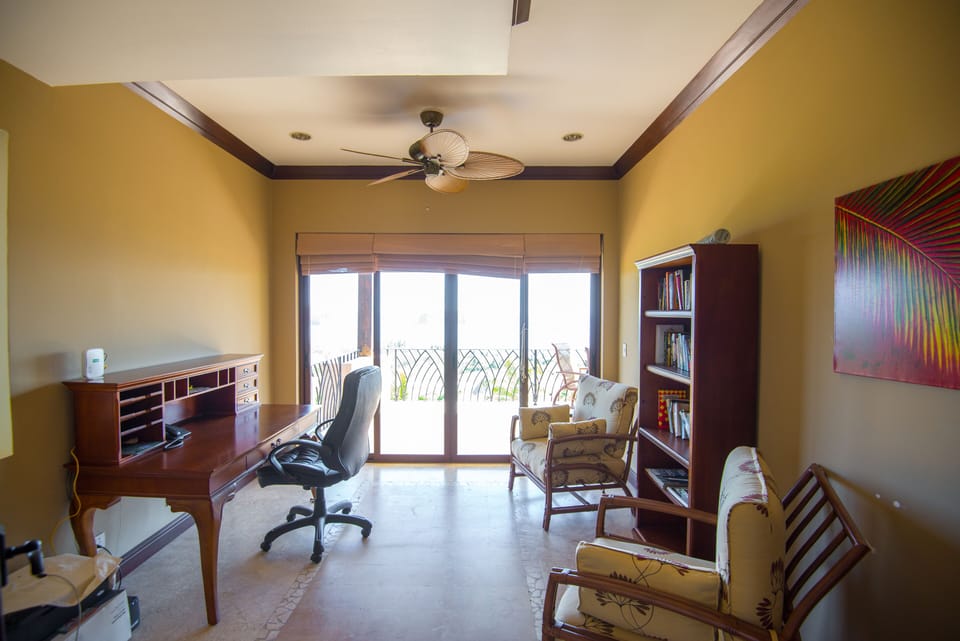 Work from home in this quiet & private office.  Easy access to upper sundeck. 
