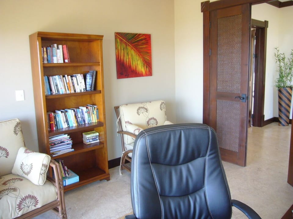 Handy library room off master king bedroom. 2nd room safe located in this room.