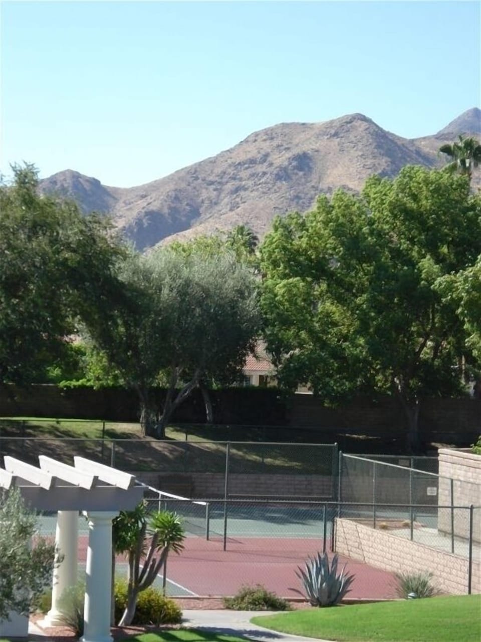Relax with a beverage and enjoy the 2nd bedroom balcony view!